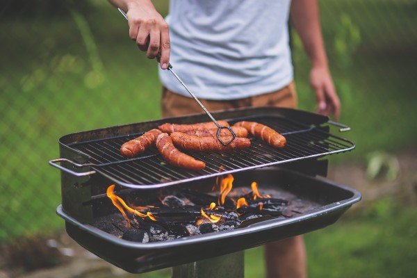 Passive investor grilling meat while enjoying ROI
